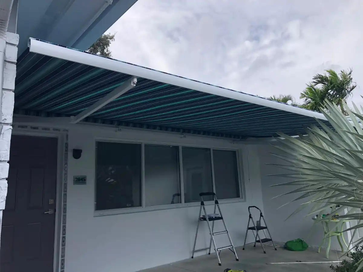 Fixed awning providing shade for a Fort Lauderdale pool deck