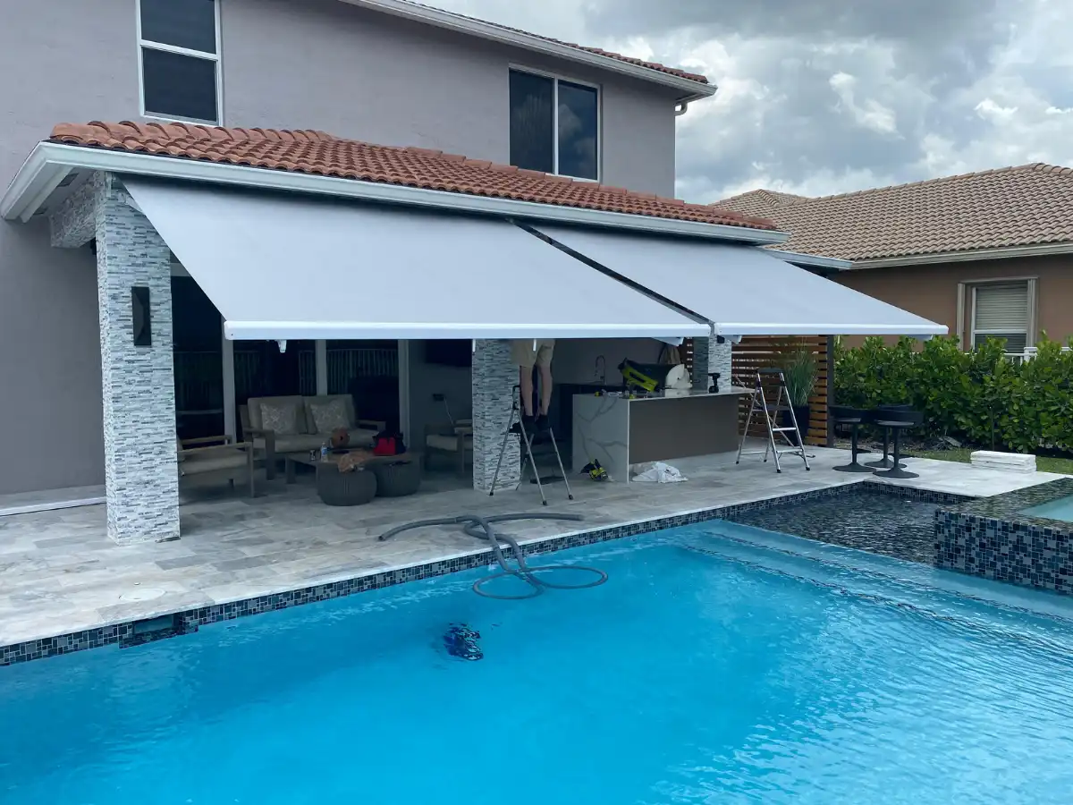 Retractable motorized awning over a South Florida patio