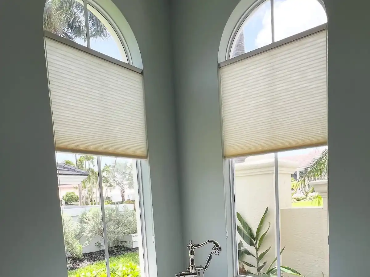 Double-cell cellular shades reducing cooling costs in South Florida