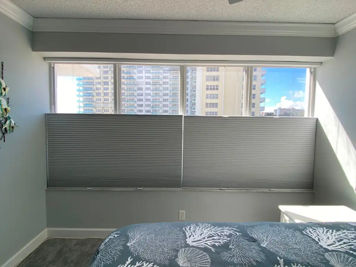 Honeycomb cellular shades in a Fort Lauderdale master bedroom
