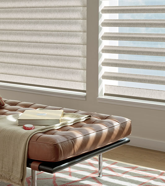 Motorized smart shades controlled by phone app in a Florida home
